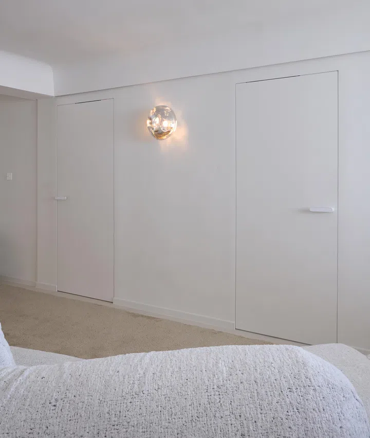 The particular silver chrome abstract wall sconces deserve a moment. 
