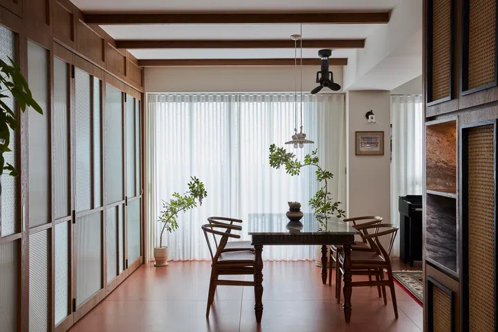 Materiality completes the home’s cultural narrative, exemplified by the custom dining table.