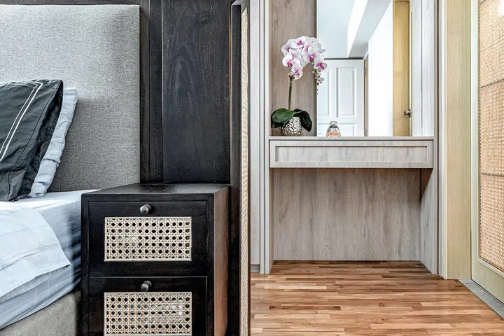 A mirror installed against the wall helps to visually open up the space.