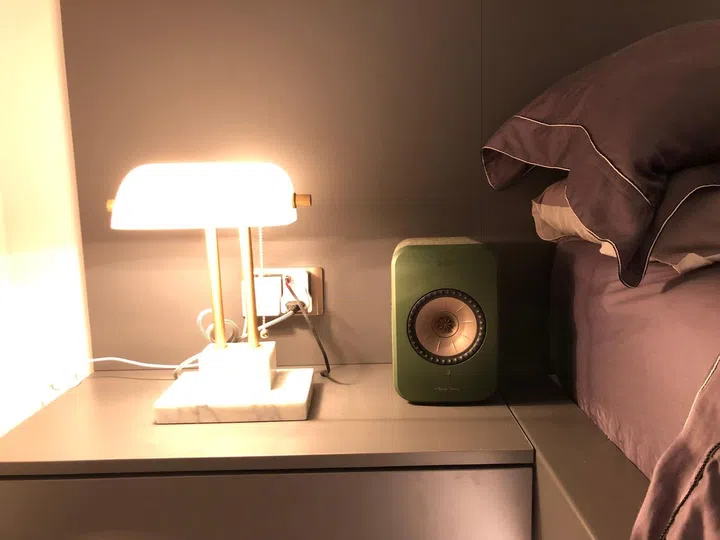 The LSX speaker looking sleek and stylish on the bedside table.