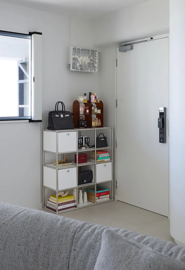 Entryway to fashion stylist Rong's HDB bachelorette pad.