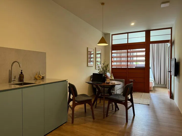 Neat little kitchenette and dining table set within my 1-bedroom suite in Alma House New Bahru.