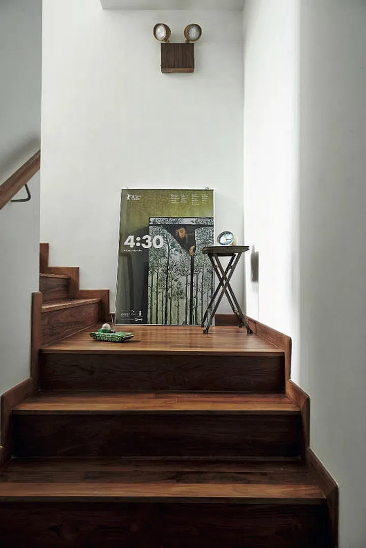 Posters of films directed by Royston Tan accompany the assortment of vintage decor and retro accessories throughout the apartment.