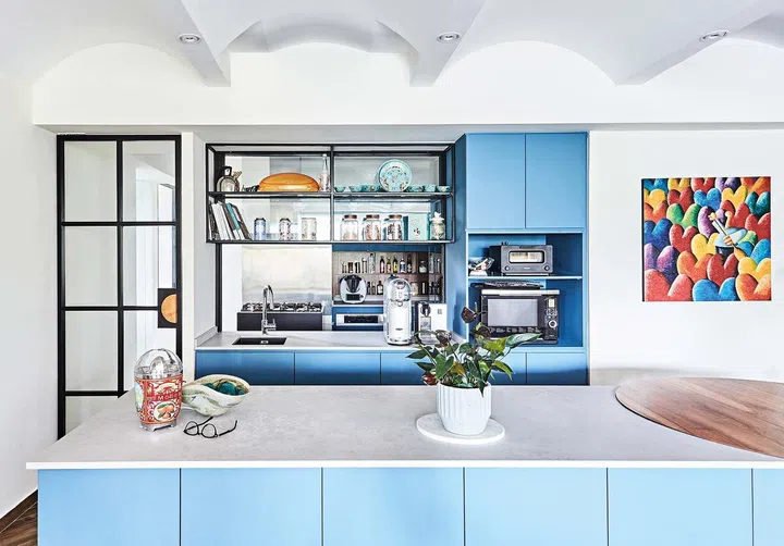 A counterweighted sash window separating the dry and wet kitchen was one of the trickiest design elements to figure out in the design.