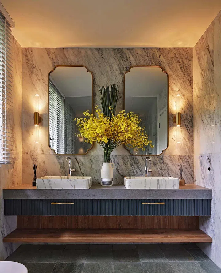 The existing window in the master bathroom was relocated and enlarged to introduce more natural light into the space.