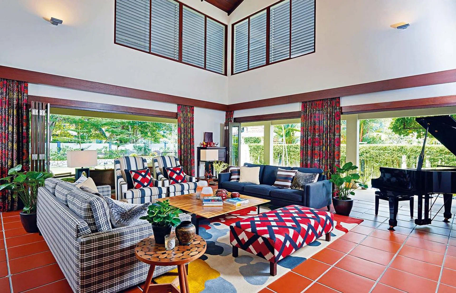 The double-volume living room opens up to the outdoors.