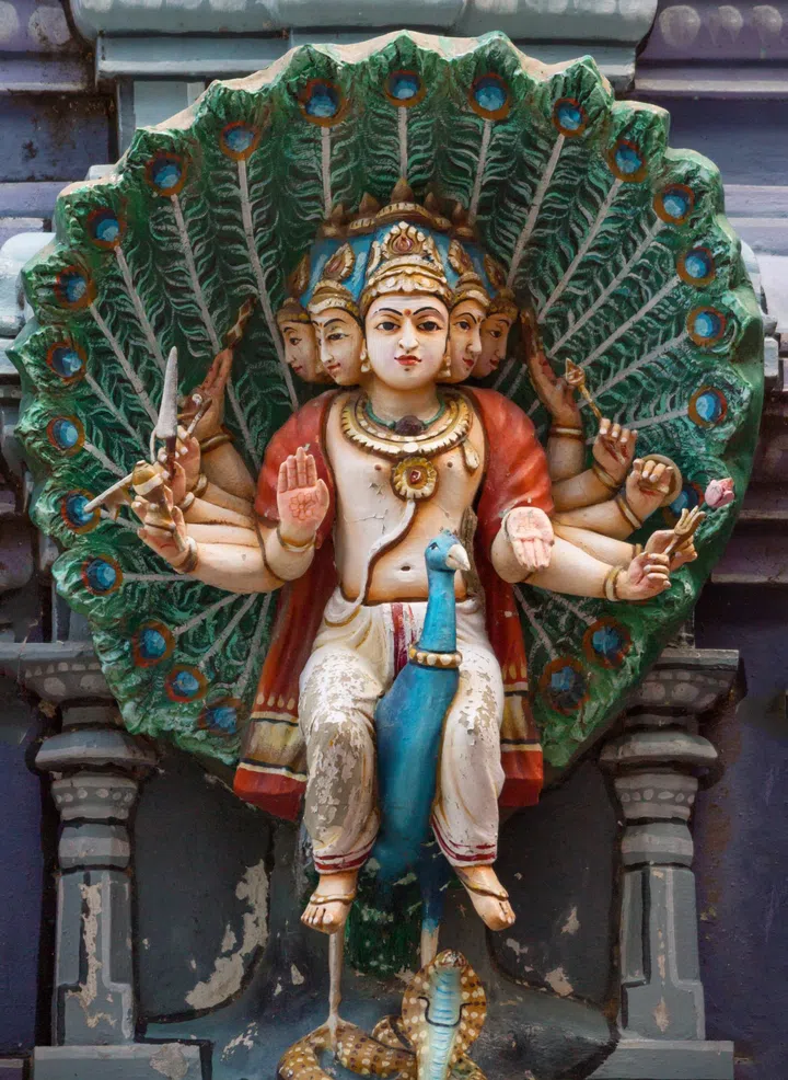 Murugan on his peacock mount statue on Gopuram at Rathinagiri Hill Temple in Tamil Nadu, India