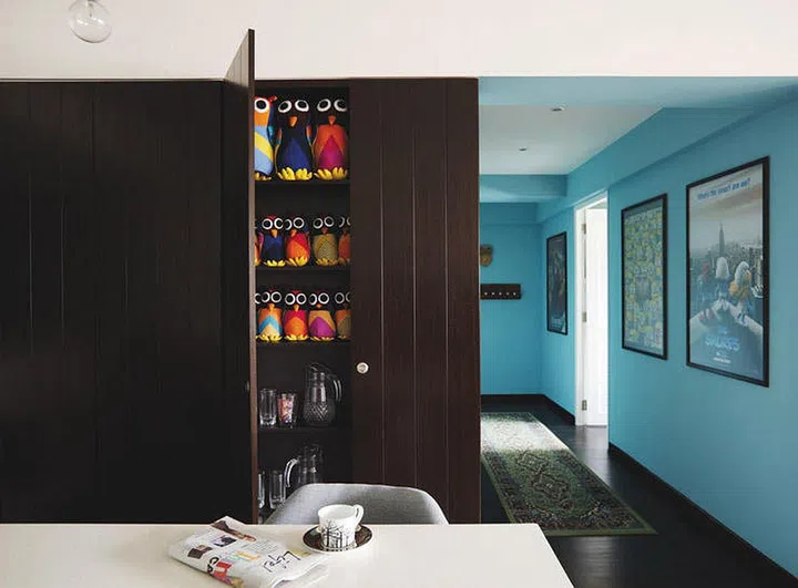 While the larger areas were given a light, soft palette, the corridor was painted a deeper shade of blue to bring a splash of colour into the home. 