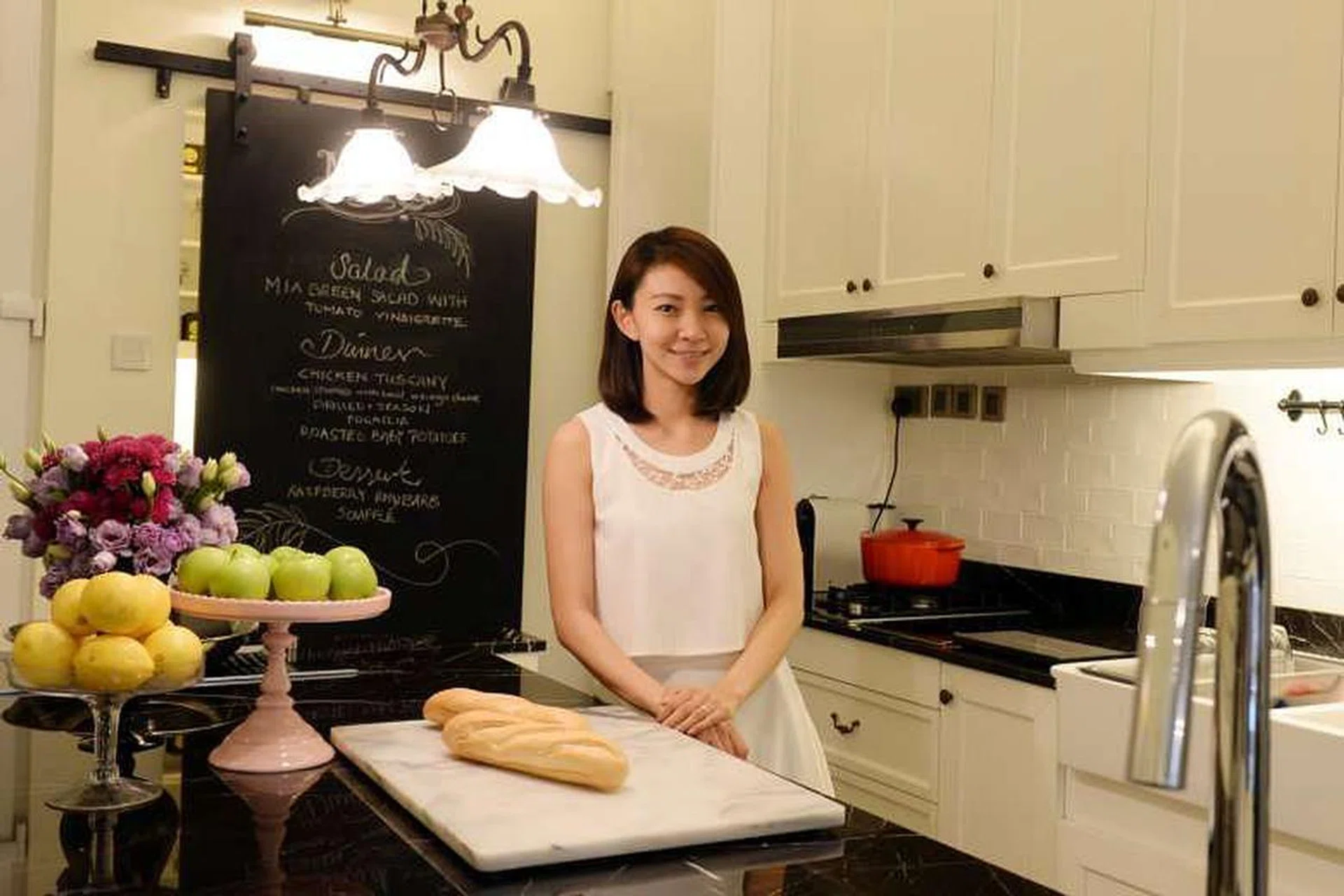 Ms Felicia Gan in her open-plan kitchen