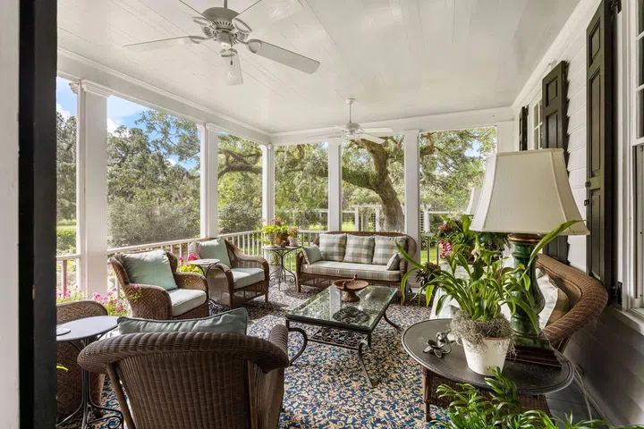 A screened-in porch offers lots of room fro entertaining.