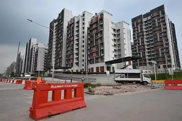 HDB said the keys for about 295, or 12.6 per cent, of the 2,333 units in Plantation Acres and Plantation Grange have been collected as at Sept 26. ST PHOTO: LIM YAOHUI