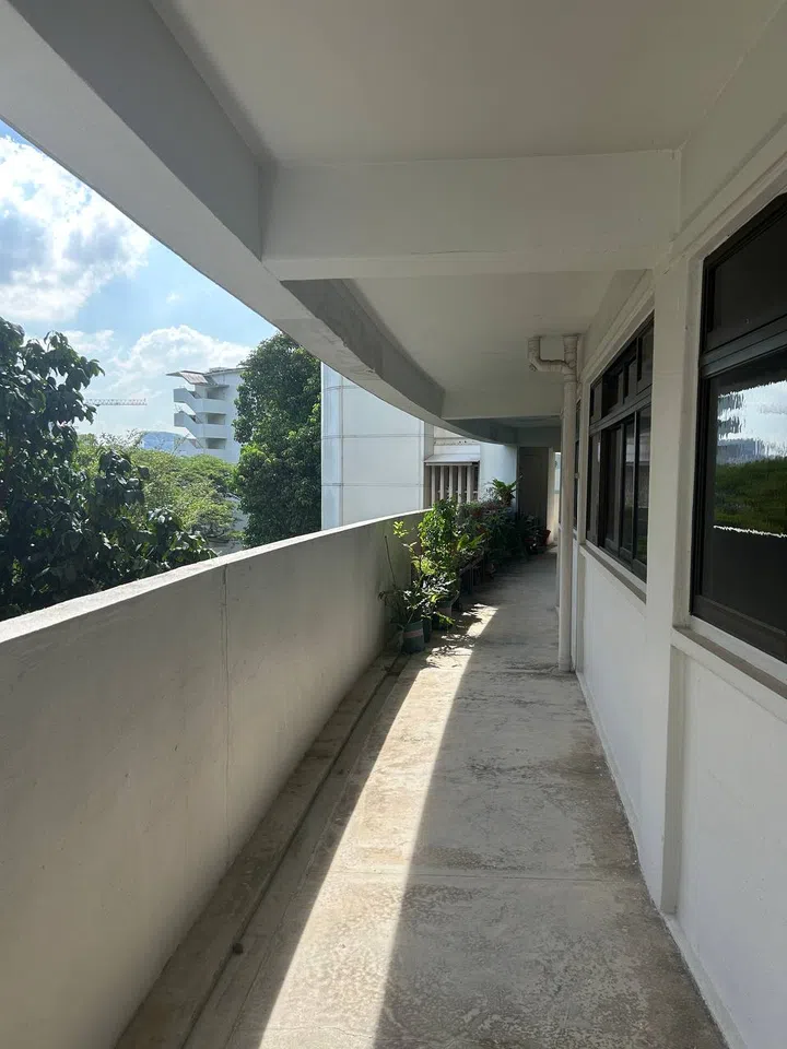 The curved corridor runs along the whole stretch of the block only on certain levels of the Butterfly Block in Queenstown at 168A Mei Ling Street.