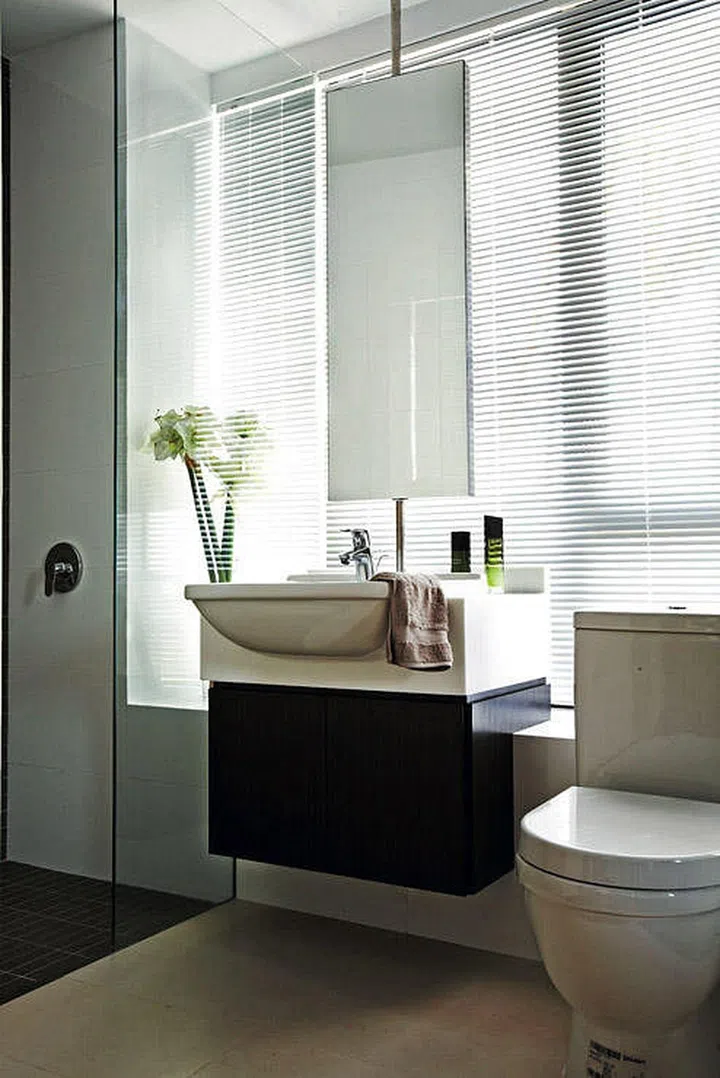 Building a sink and vanity counter over the edge of the bay window will save you extra space in the bathroom.