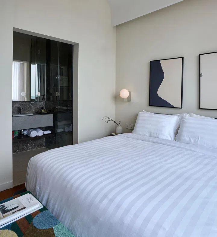 Common bathroom is accessible via both the master bedroom and common bedroom n this 840 sq ft 2-bedroom condominium at Hillview Rise.