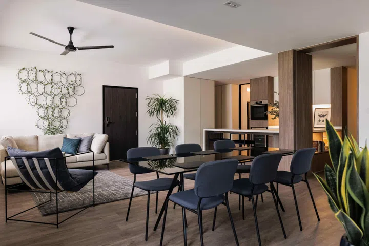 Extensive hacking of walls and reconfiguration was carried out during the renovation in the living room, dining room and kitchen.