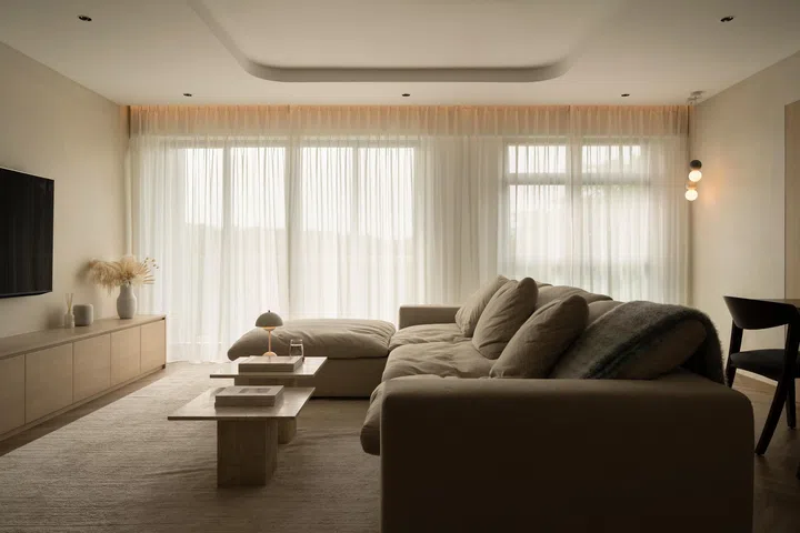 The warm and inviting living room with lots of natural light. 