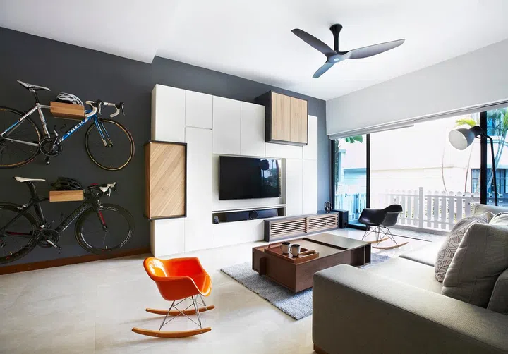 Modern Scandinavian. Customized wall hung storage boxes for bicycle mounts. Integrated Storage Cabinets for TV feature wall area.