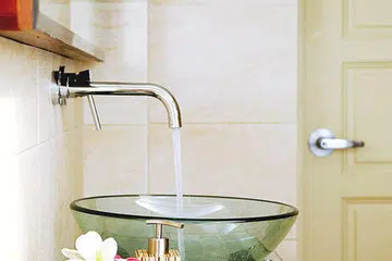 Washbasin from Magnum Contracts and basin tap from Adamas Bathroom