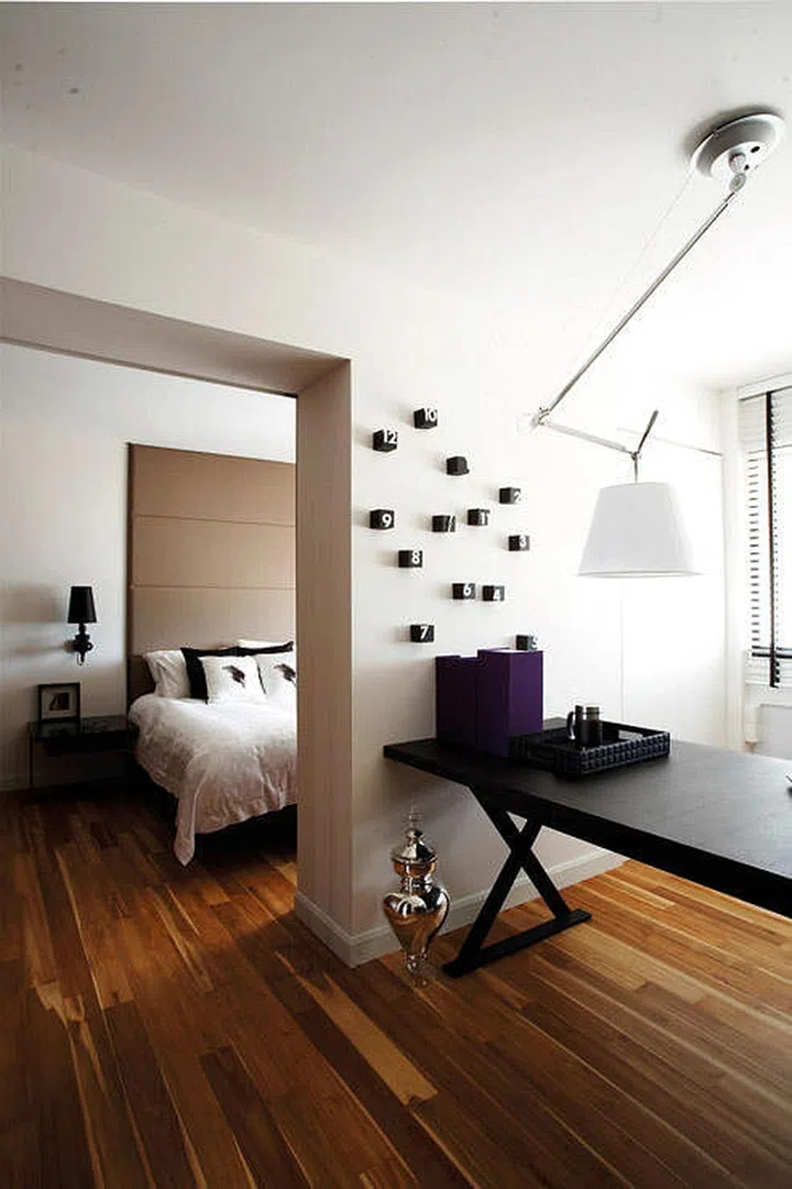 This interior designer converted a second bedroom into a walk-in wardrobe and a study area. Interior design by Mong Design.