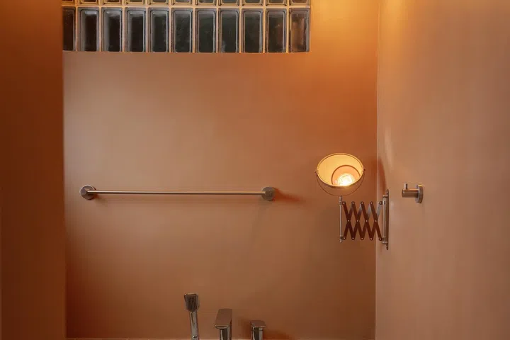 Each bathroom carries its own distinct atmosphere.