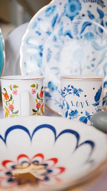 Close up of retro cups and plates at Lovera Collections.