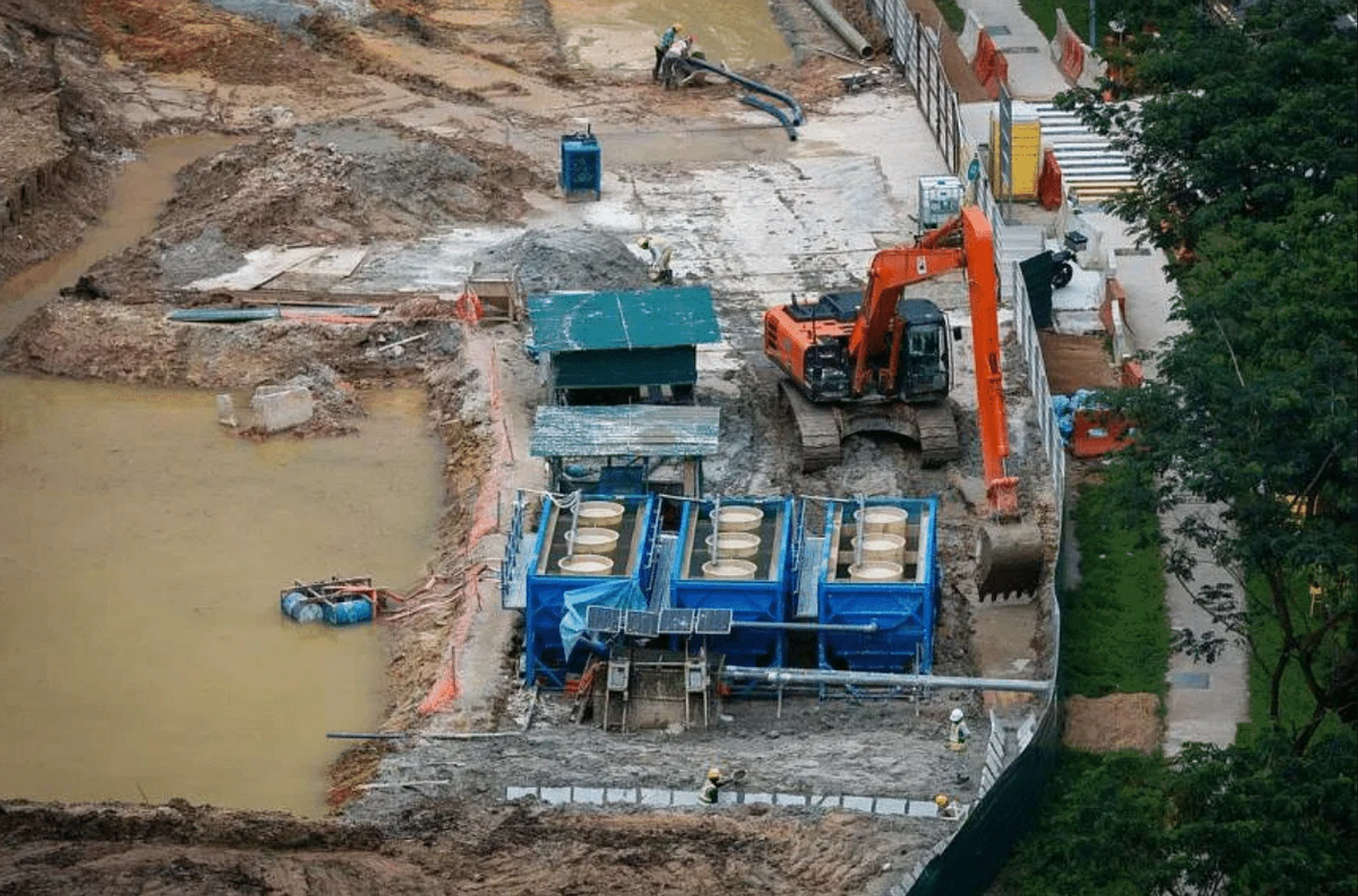 Areas of exposed earth at the Bukit Batok Hillside Park site could not be covered in time with biodegradable earth control blankets. ST PHOTO: GAVIN FOO