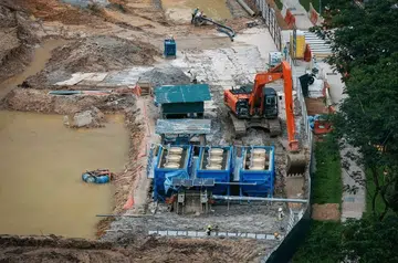 Areas of exposed earth at the Bukit Batok Hillside Park site could not be covered in time with biodegradable earth control blankets. ST PHOTO: GAVIN FOO