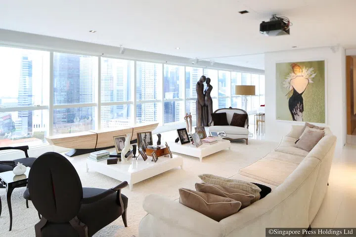 A 17,000-piece mosaic artwork of a woman’s silhouette called 'Le Bouquet' dresses up a living room wall in the late British luxury furniture designer Christopher Guy Harrison's 3-bedroom condominium in High Street Centre in Clarke Quay.