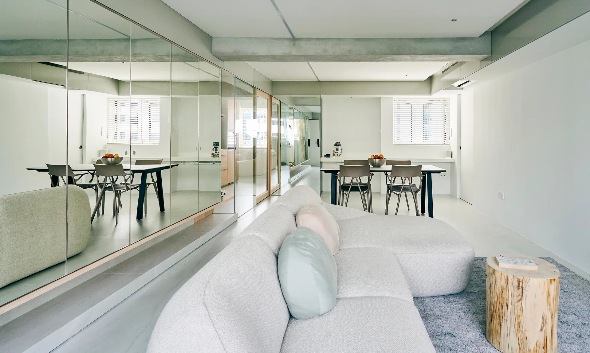 The open plan living room leads to the dining area.