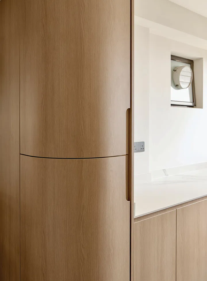 Curved design elements flow throughout the home, adding softness and a sense of continuity to the interiors.