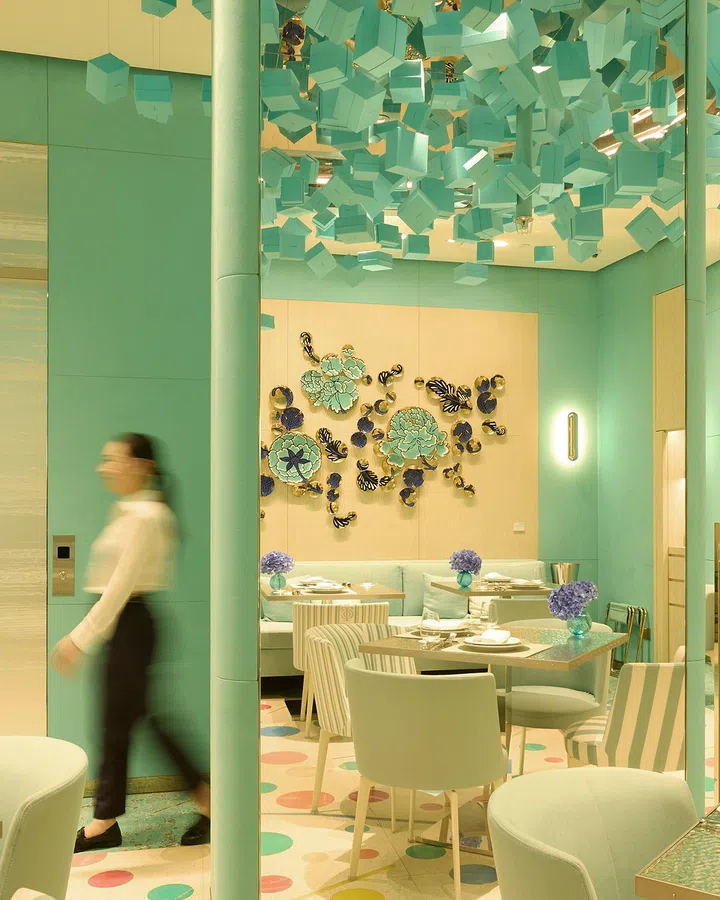 All Tiffany & Co. Blue Box Cafes bear the same robin egg walls, Blue Box ceiling, tables, chairs, and flatware.