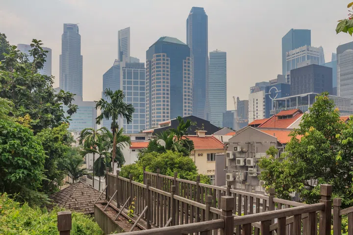 Singapore, Singapore - June 16, 2013: Famous Club street in Singapore with colonial houses. Smog in the air is caused by the annual burning of palm plantations in Indonesia.