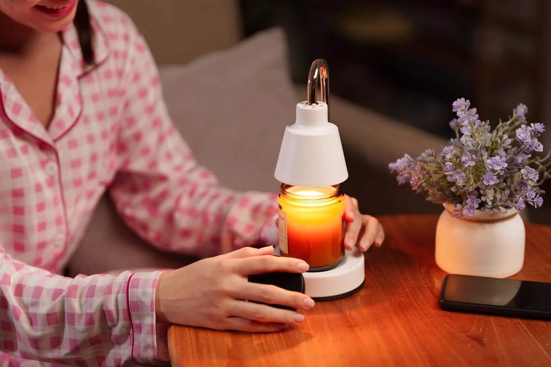 Discover ultimate relaxation for a longevity lifestyle with an aromatherapy candle warmer creating a serene peaceful evening ambiance.