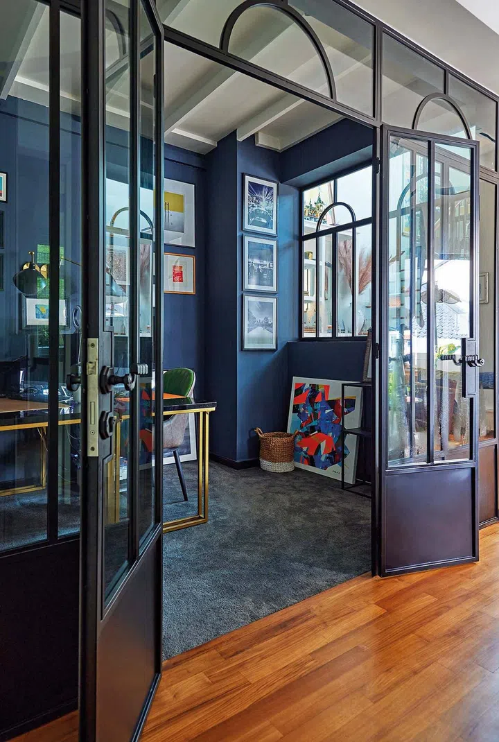 The study room enclosure continues the Crittall-style theme, but with a little twist at the top