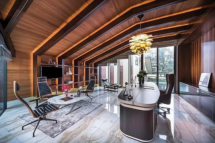 A luxurious study with polished marble flooring