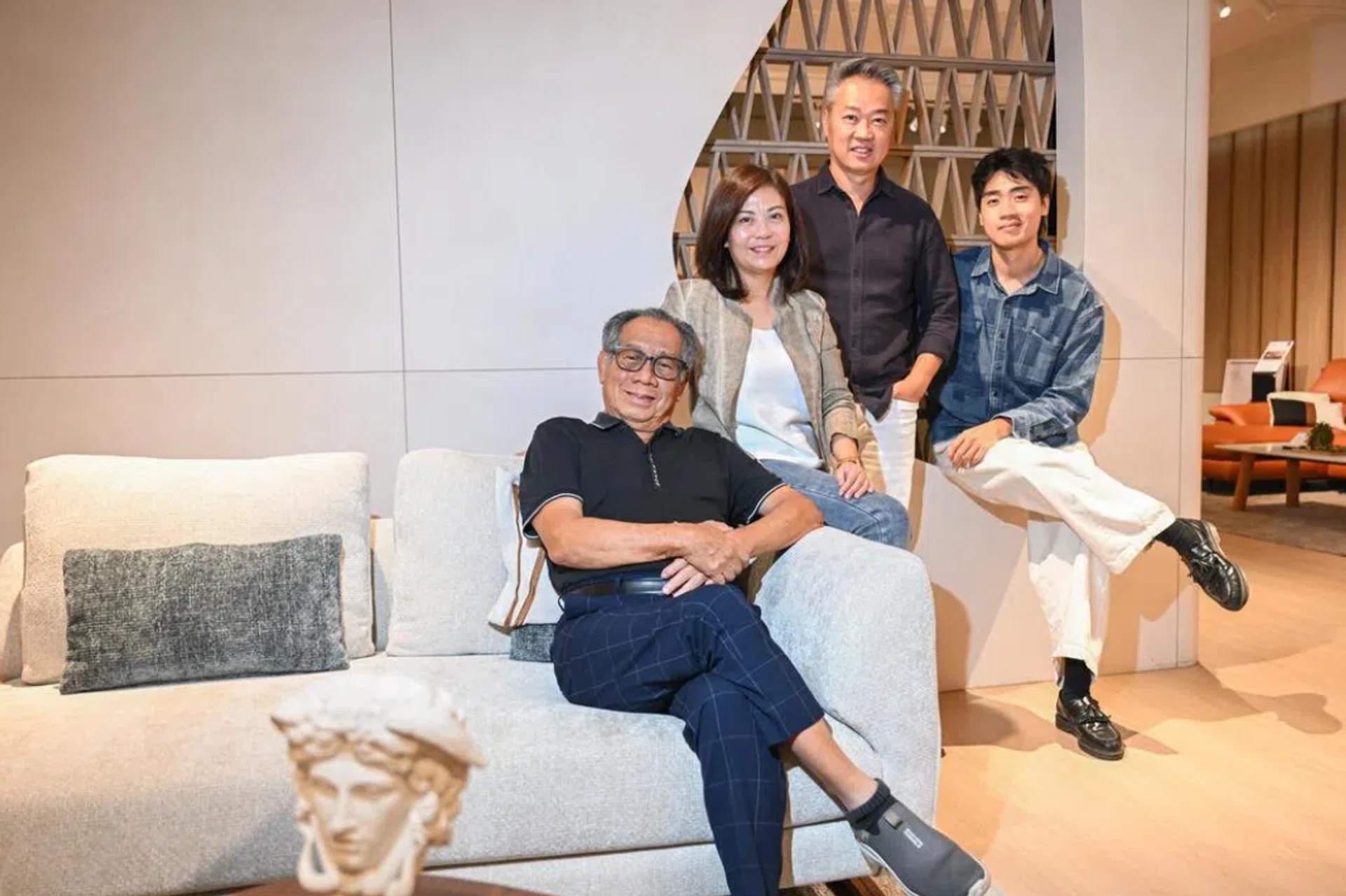 The family behind Cellini includes founder-chairman Tan Cheng Whatt; his daughter and group marketing director Janice Tan; son-in-law and group managing director Jason Hong; and grandson Tyrus Hong, who joined the company in June as a product designer. The founder is seated on the Evita modular sofa.