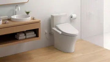 Enhance your bathroom experience with advanced toilets from Japanese brand Toto. Photo: W.Atelier