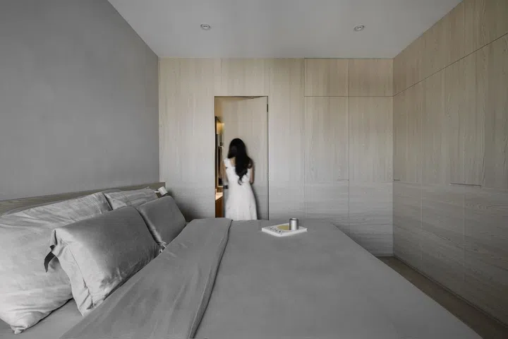 Master bedroom in a young lawyer couple's 3-bedroom condominium in Bishan.