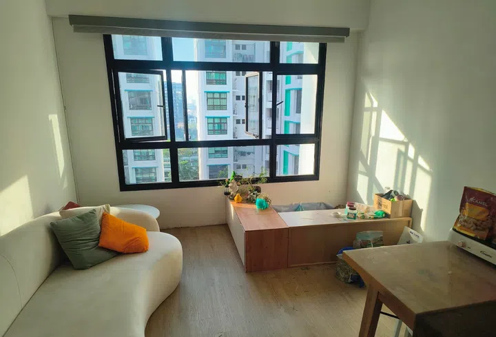 The completed living room of Mr Sim Kwang Wei’s four-room flat, whose renovation was partly taken on by the home owner himself.