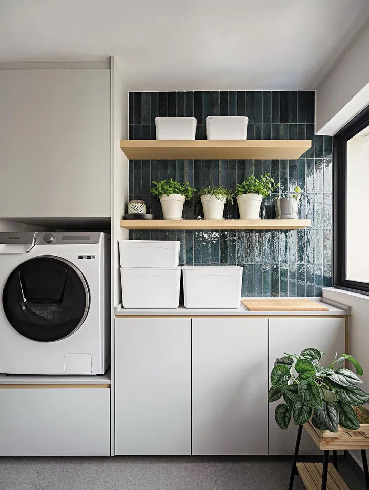 No detail was too minute for Raymond and Max, who elevated the front load washing machine to make loading laundry easier.