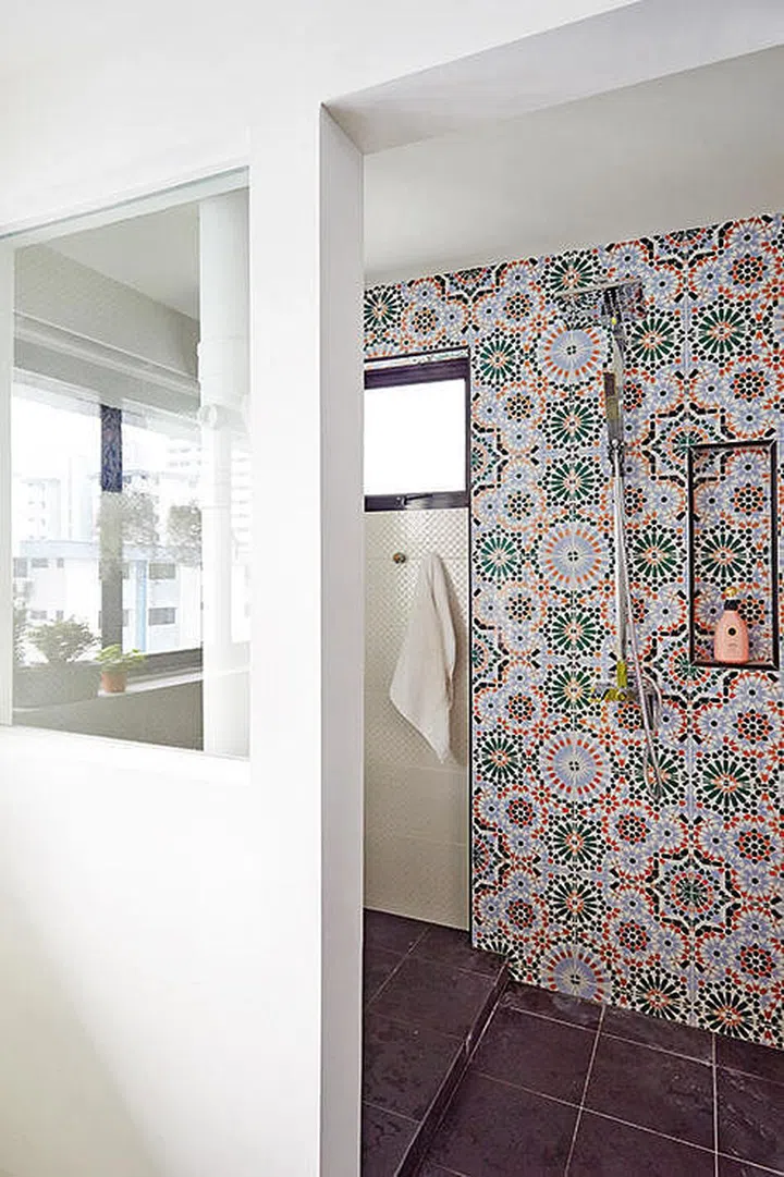 Jazz up your plain bathroom with Moroccan-style tiles. Interior design by D'Haus.