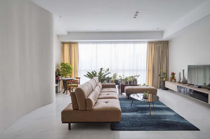 Living room in a 1,550 sq ft 3-bedroom condominium apartment in Keppel Bay. Interior design by Weiken.