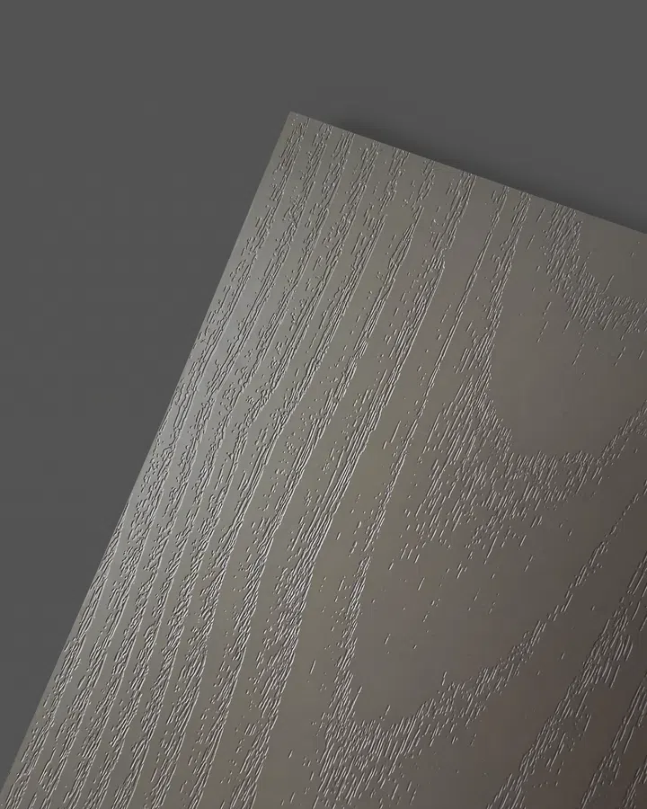 UniSurface is defined by solid, uniform tones offered across three finishes: two wood textures - sandblasted and ash - and a linear finish.