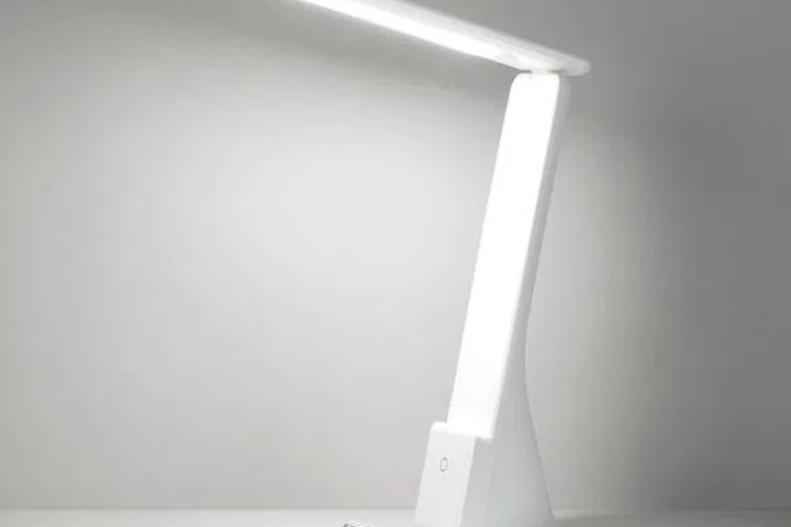 The Nitori LED Desk Lamp is compact and portable, perfect for multiple uses.