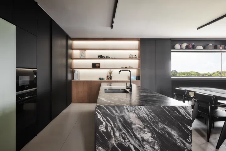 The open plan Dry Kitchen with its granite single-slab island. Image by Third Avenue Studios.