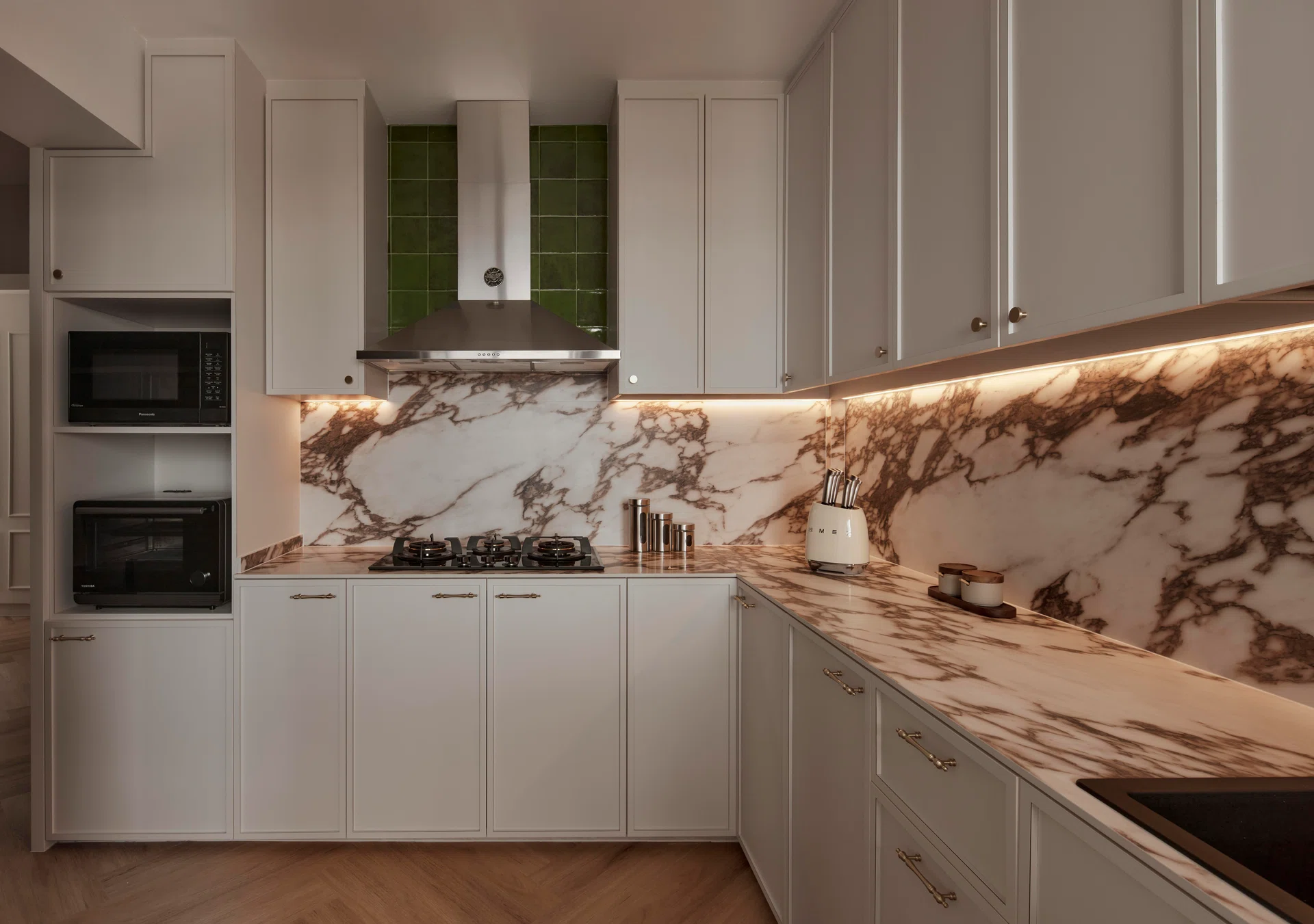 Kitchen in a 4-room HDB BTO (1,004 sq ft) in Bishan, designed by RENOSTUD.IO.