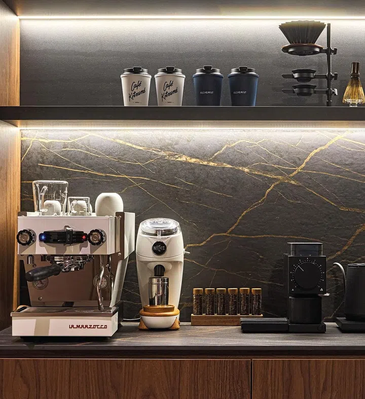 The wood tones
blend beautifully
with the marble
flooring and
beige wall
textures.