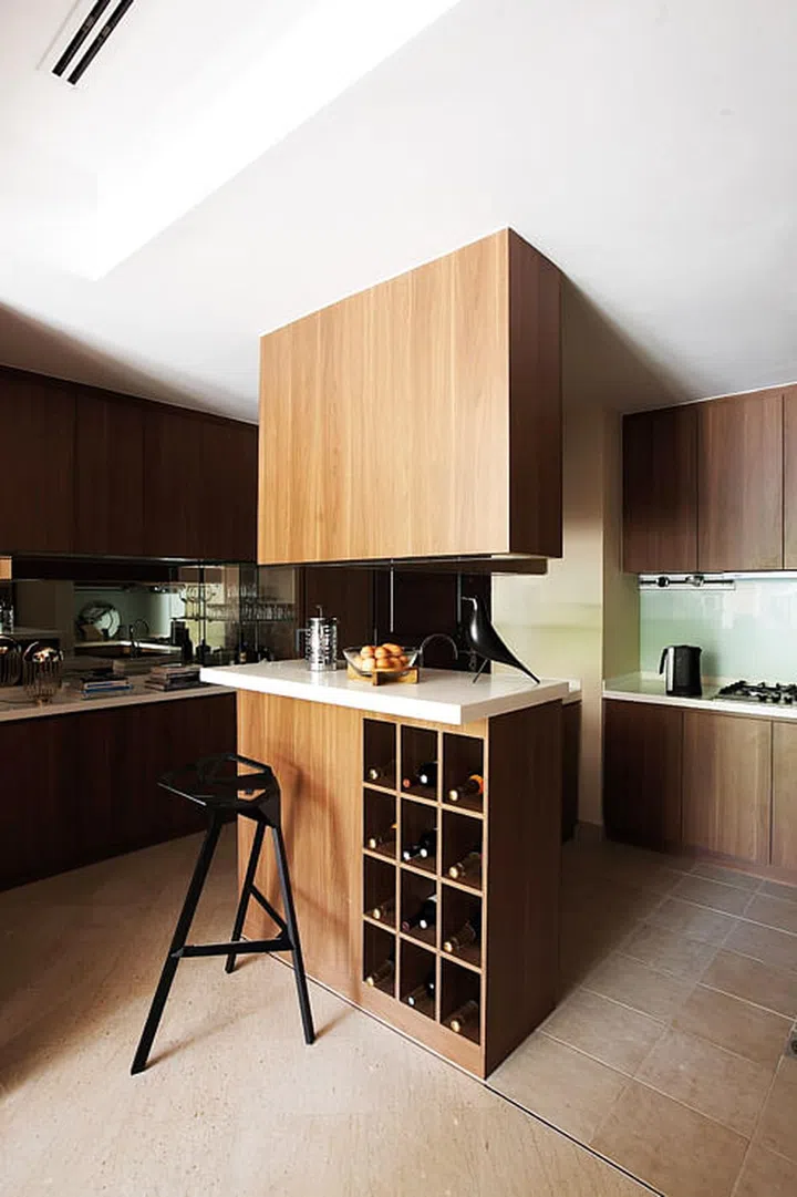 Even basic kitchen appliances and tools such as the kettle, coffee machine and tableware were picked by the designer to complement the apartment’s style.