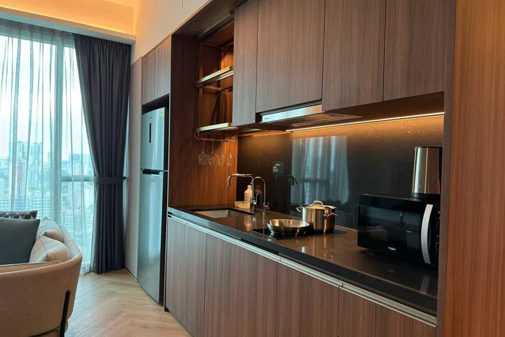 Convenient fully equipped kitchenette space behind the living space at Quincy House.