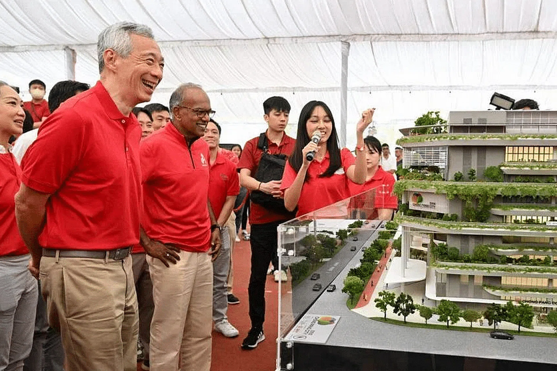 PM Lee Hsien Loong and Minister for Home Affairs and Minister for Law and Chong Pang MP K. Shanmugam viewing a model of Chong Pang City at its groundbreaking ceremony on Sunday. ST PHOTO: CHONG JUN LIANG